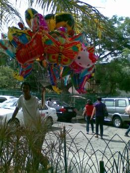 balloons - another kind of balloons that easily attract little children sold by a vendor just outside a church