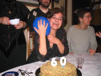 Birthday party. - A picture of my 60th birthday. I had candles, ballons, family and friends.