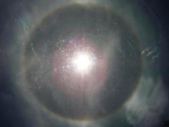 rainbow surrounding the sun - image taken on may 7, 2010 at about 12 noon.