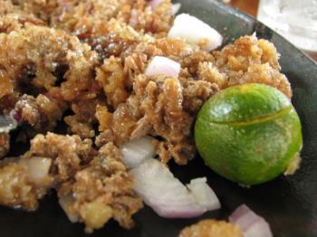 Dencio&#039;s Sisig - Sisig.. a Filipino dish made from parts of a pig’s head and liver, usually seasoned with calamansi (Philippine lemon) and chili peppers.