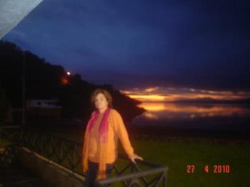 End of sunset at the terrace - The end of sunset at the Villarrica lake. Chile. The colours od the sky and the mirror in the lake were out of this world.