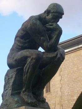 Rodin&#039;s Thinker - The photo shows the eternal enigma of the &#039;thinker&#039;, a creation of Rodin, the great French Sculptor/artist.