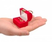 Handing over a gift in your palm - This photo displays the special occasion of giving a gift to someone you like or love.