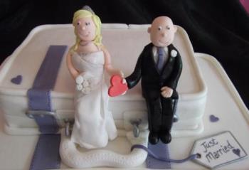 Bride and groom - A sugar paste bride and groom Bride and groom - A sugar paste bride and groom