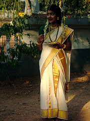 Set-mundu - Girl wearing set-mundu, the traditional cloth of Kerala