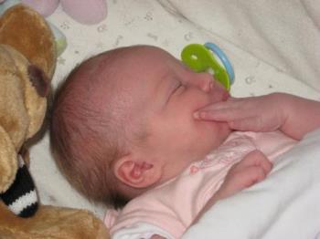 Suck a finger!! - She much prefers her fingers to her dummy!!