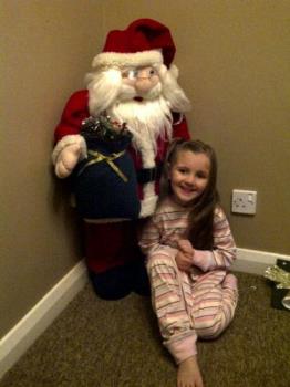 Becky and Santa - Santa in his new home with my granddaughter