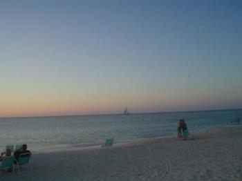 A relaxing view of Aruba´s beach - I love to relax under the sun looking at the sea and the sun.
