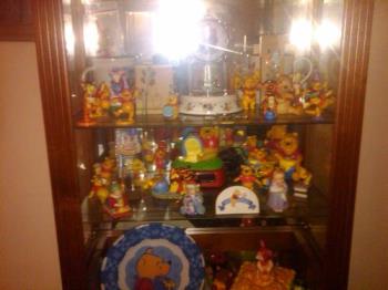 Winnie The Pooh - Here is one of my Three showcases. Each showcase is 9 feet tall. 