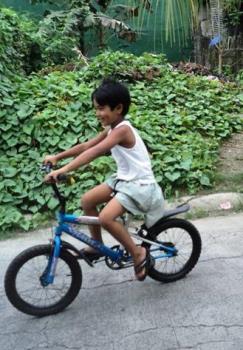 Enjoy biking - Little Boy on his bike