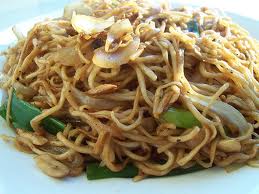 Chow Mein - Chinese-American dish consisting of a combination of stewed vegetables and meat served over fried noodles.