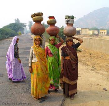 Women carrying water - Carrying water - Rajasthan, India