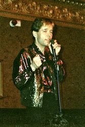 Singing star? - No, not at all, just me many years ago now singing in what may have been a pub in London.