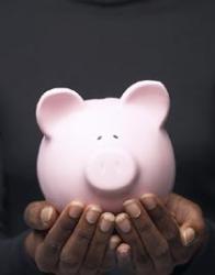 Piggie Bank - A piggie bank between hands, meaning soon to be killed for money (how sad T_T)
