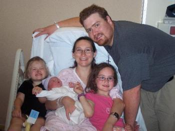 A family of five - This is the day Curtis was born. In the hospital room when he was about seven hours old.