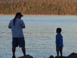 Father and Son out fishing - This is a picture I took when I was out at the lake. I like this picture alot. It turned out so nice and I did send it in to a photo contest and I was so surprise it made to the finalist. It is however publish on book covers and use as big posters around the world. If you do see this picture, tell me what you think of my piece of art. 