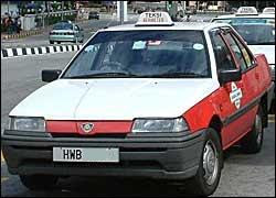 This is how our Malaysian taxi looks. The taxi dri - This is how our Malaysian taxi looks. The taxi drivers here are mostly friendly.