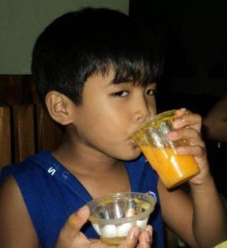 Drinking juice - I drink fresh mango juice every day.
