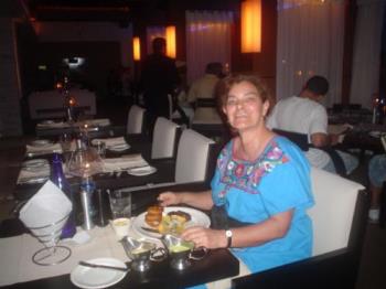 At Aruba with a mexican dress - I took one of my mexican dresses to Aruba, when I went on 2008. Here, having lunch at a restaurant.