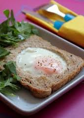 Egg at wholed toast - You have to make a whole in a toast, and then fry the egg in that bed.