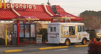 Crazy Things We See - SpongeBob Icecream Truck going through the drive thru with a dog hanging out serving window.