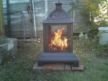 One of our fires. - We bought ourselves an early Christmas present in 2011 and got a fireplace or firebox for outside.