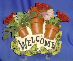 Welcome - Welcome flower pot sign.