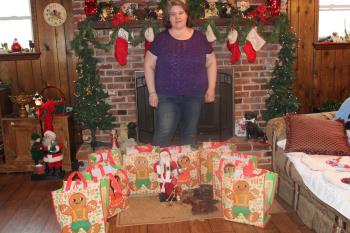 That is my daughter standing in front of the fireplace, and the bags are what we fixed for the elderly in our church and the nursing homes, and special people.