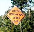 water on road - sign