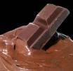 melting piece of chocolate - a bar of chocolate candy melting