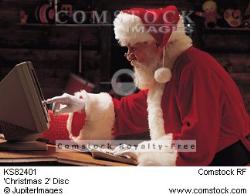 Santa on computer. - Santa Claus in this new generation has become more advanced.