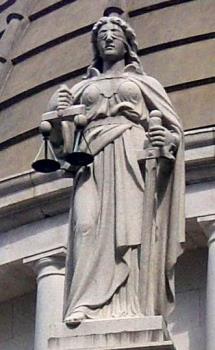Justitia blindfolded and holding balance scales and a sword. Court of Final Appeal, Hong Kong https://en.wikipedia.org/wiki/Lady_Justice