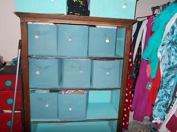 free bookshelf turned clothes storage