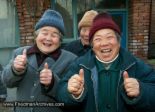 Thumbs Up - Photo of two women giving all thumbs up.