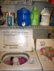 Why I use liquid Detergent - Liquid, I keep it on a shelf above my washer, and just push the little button to drop some liquid into the washer.

Call me lazy!
