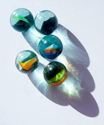 marbles - a few marbles in reflective light