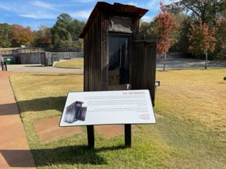 Outhouse at Elvis’ birthplace.  Photo taken by and the property of FourWalls.