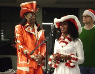 Bootsy Collins & his wife, Cincinnati, Ohio, December 2010. Photo taken by and the property of FourWalls. Bootsy Collins & his wife, Cincinnati, Ohio, December 2010. Photo taken by and the property of FourWalls.