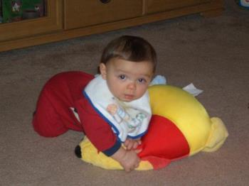 Graysen beating up Pooh! - Graysen with Winnie