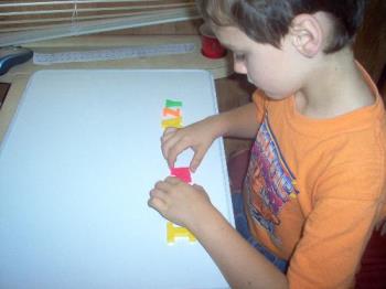 fun game with words - take magnetic letters on a fridge or board and play showing how many different words can be made with the same letters, etc.