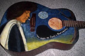 Bob Dylan on guitar - I painted this with acrylics on an acoustic guitar.