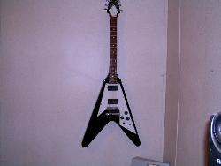 V Guitar ~~ click on picture for more info - This is one of my son's guitars. He has 4 electric guitars and 3 acoustic guitars. That's not counting my electric guitars of which one is a Gibson Les Paul 1980 edition. V Guitar ~~ click on picture for more info - This is one of my son's guitars. He has 4 electric guitars and 3 acoustic guitars. That's not counting my electric guitars of which one is a Gibson Les Paul 1980 edition.