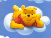 sleeping on clouds - pooh bear