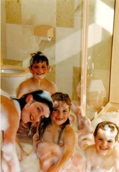 Bubble Children - Too much shampoo in a spa bath has fun results!