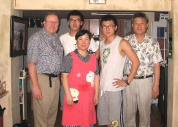 Family I visited that gave me a handmade metal Cro - This is the student and his family.  His brother makes the cross and considers it a way to share his faith.