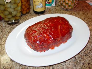Meatloaf - Meatloaf with sauce or ketsup on top.