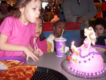 My daughter&#039;s brithday - My daughter blowing out her candles on her 7 brithday.