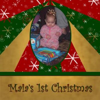 First Christmas - This is a photo of my daughter from her first Christmas. I designed all of the digital papers I used to make this digital scrapbooking page. They are all available to download from my blog at http://pillowgirlscraps.blogspot.com