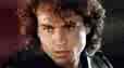 Michael from the movie Lost Boys - Dark hair, tall, young male who falls into bad form with a group of locals.  surprise!!!