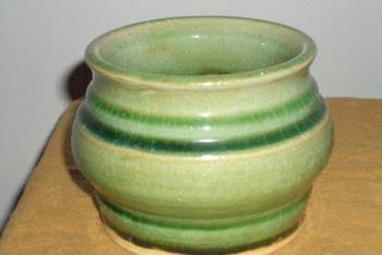 ceramic bowl, handmade - homemade handmade ceramic bowl, green glaze, food safe glaze, wheel thrown.  I love ceramics and I love making pieces like this to give to friends as little gifts.  This is one of my earlier peices, so it&#039;s not as well finished, but I love the green!